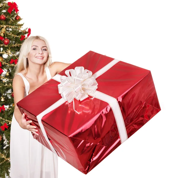 Christmas flicka i santa hatt hålla röd presentask. — Stockfoto