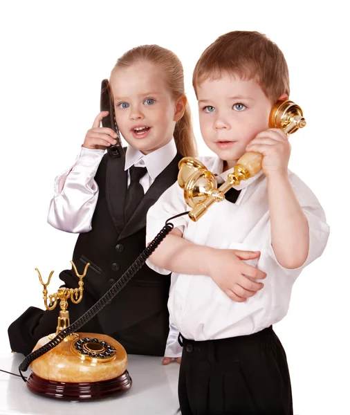 Τα παιδιά στο επαγγελματικό κοστούμι με τηλέφωνο. — Φωτογραφία Αρχείου