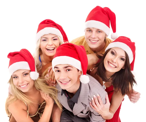 Noel Baba şapkası içinde genç grup . Telifsiz Stok Fotoğraflar