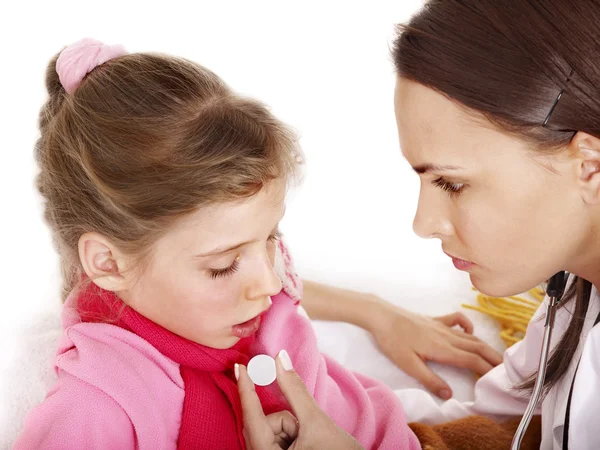 Sick child with doctor. Isolated. Stock Photo