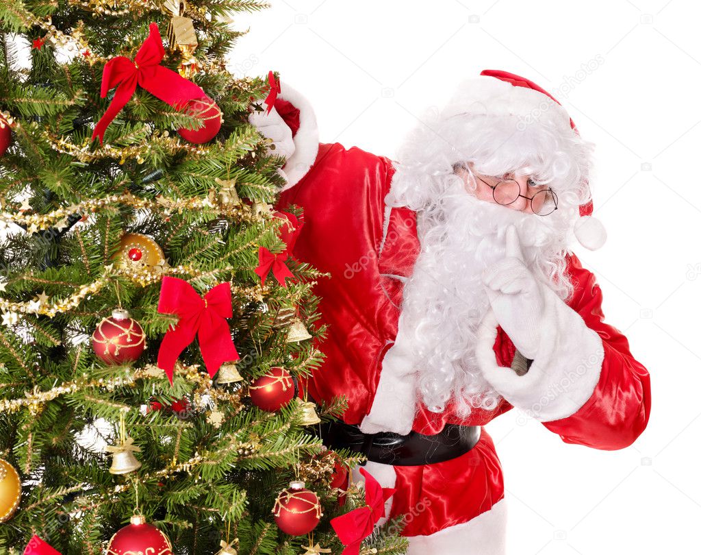Santa Claus making silence gesture.