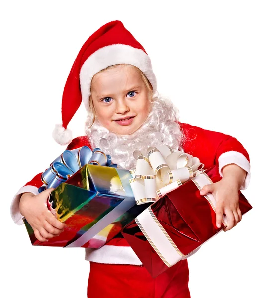 Child in santa costume holding group gift box. — Stock Photo, Image