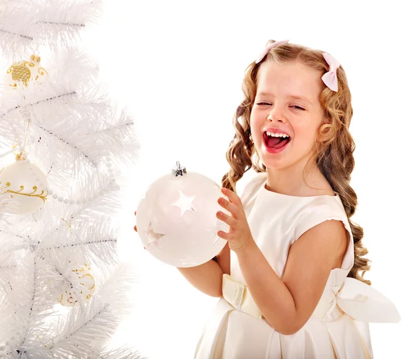 Child decorate Christmas tree. Royalty Free Stock Photos