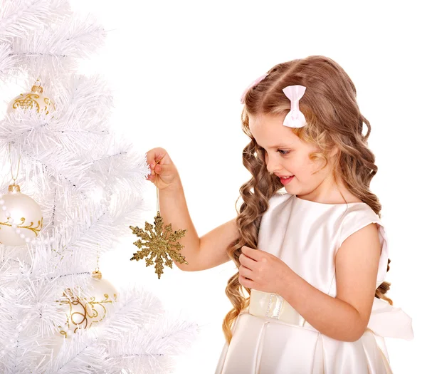 Child decorate Christmas tree. Royalty Free Stock Photos