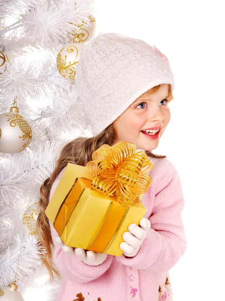 Kid with gold Christmas gift box. Stock Photo