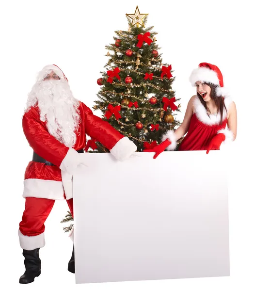 Χριστούγεννα κορίτσι, Άγιος Βασίλης με πανό και δέντρο. Royalty Free Φωτογραφίες Αρχείου