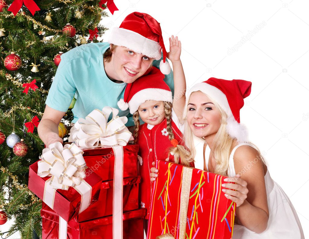 Happy family in santa hat holding gift box.