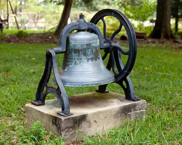 Old church bell in garden — Stock Photo, Image