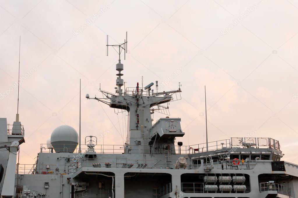 Sunset behind Royal Navy warship