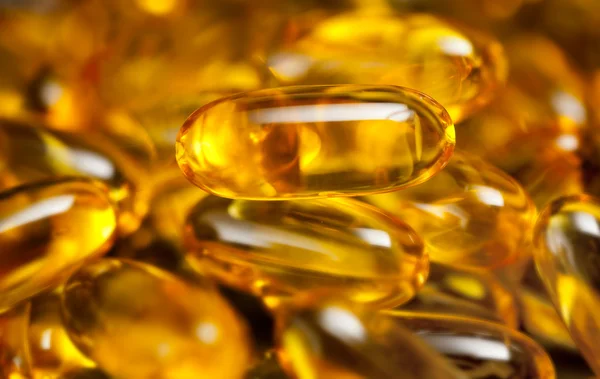 Close up of fish oil capsules — Stock Photo, Image