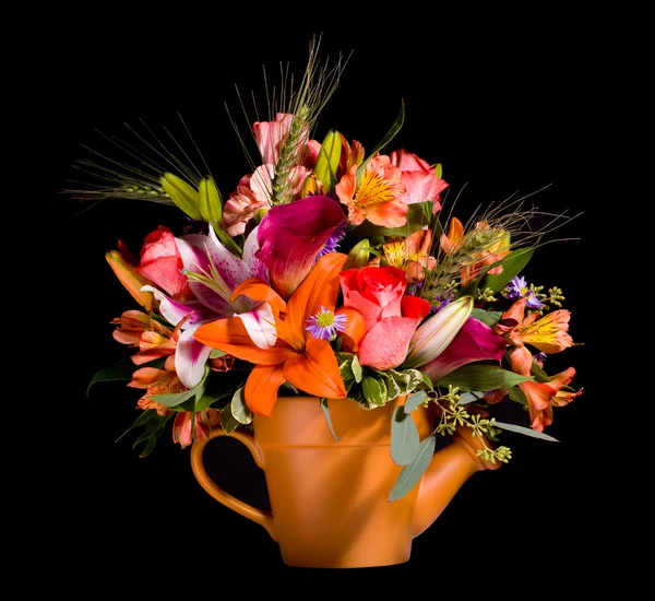 Bouquet of flowers in watering can — Stock Photo, Image