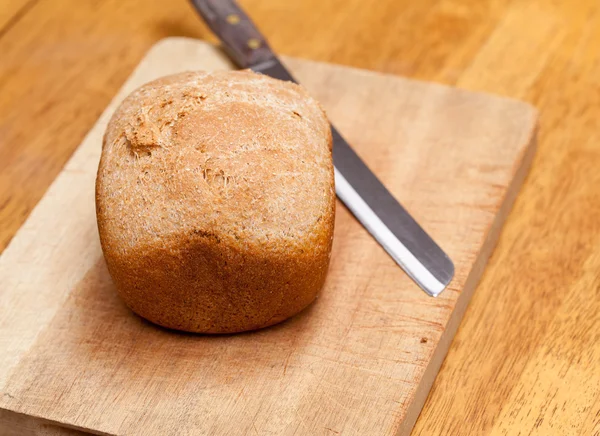 Pão de trigo assado na máquina — Fotografia de Stock