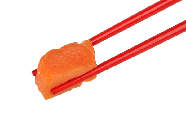 Salmon in the red chopstick — Stock Photo, Image