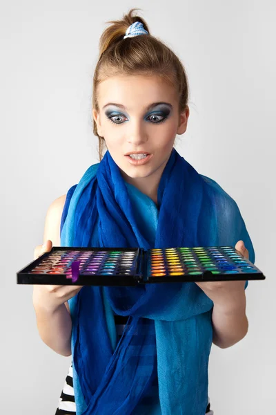 Stock Photo: Portrait of beautiful woman with makeup palette. — Stock Photo, Image