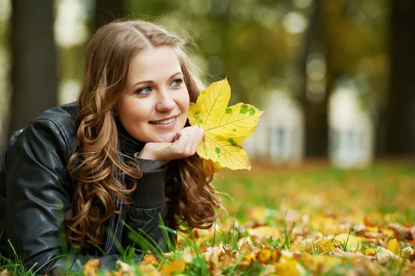 Woman at autumn outdoors — Stock Photo, Image