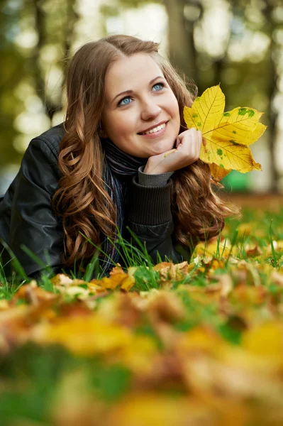 Woman at autumn outdoors — Stock Photo, Image