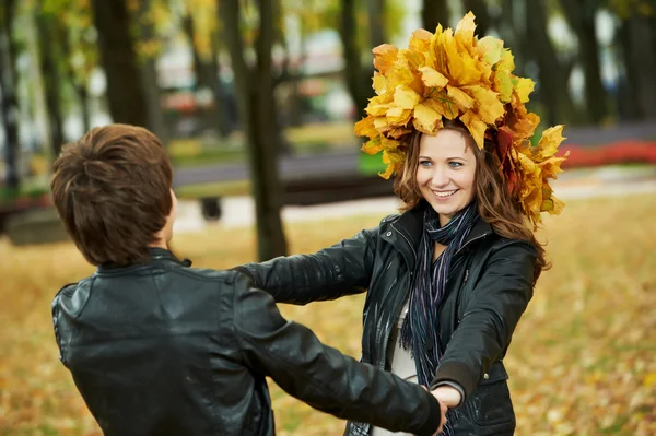 Couple at autumn outdoors — Stock Photo, Image