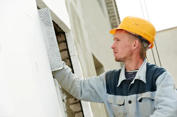 Trabalhador de estucador de fachada de construtor — Fotografia de Stock