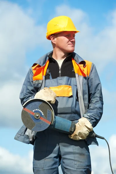 Retrato del trabajador de la construcción con amoladora —  Fotos de Stock