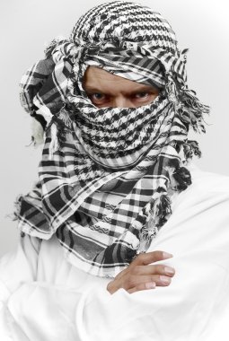 Stern arab muslim in shemagh kaffiyeh clipart