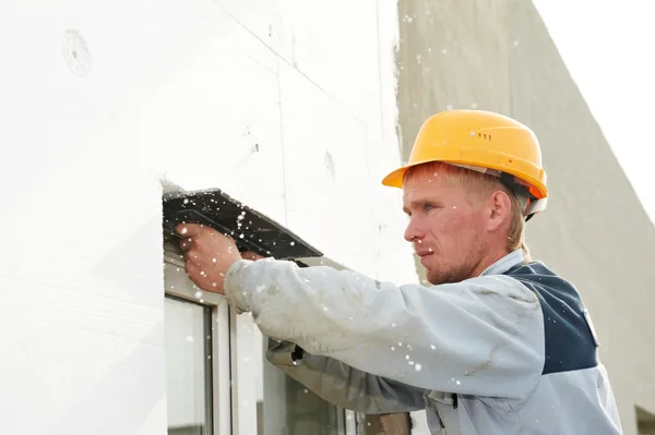 Builder facade plasterer worker — Stock Photo, Image