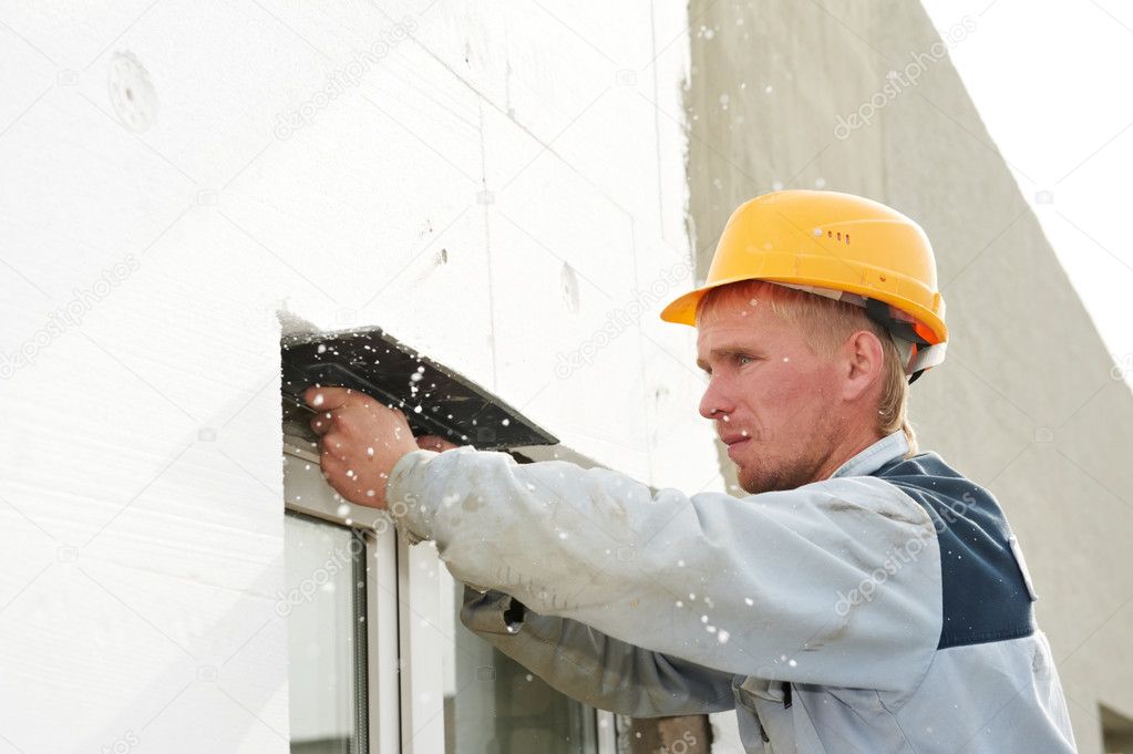 Builder facade plasterer worker