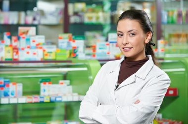 Pharmacy chemist woman in drugstore clipart