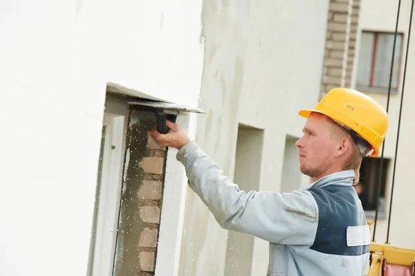 Builder facade plasterer worker — Stock Photo, Image