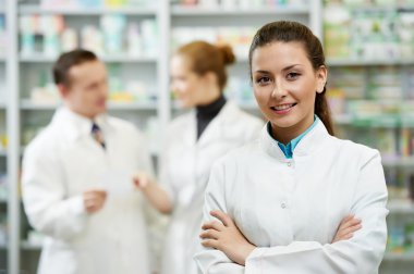 Pharmacy chemist woman in drugstore clipart