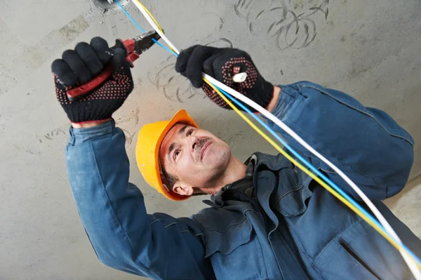 Electrician at wiring work — Stock Photo, Image