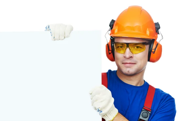 Builder in hard hat, earmuffs and goggles — Stock Photo, Image
