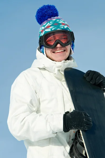 Gelukkig sportman met snowboards — Stockfoto