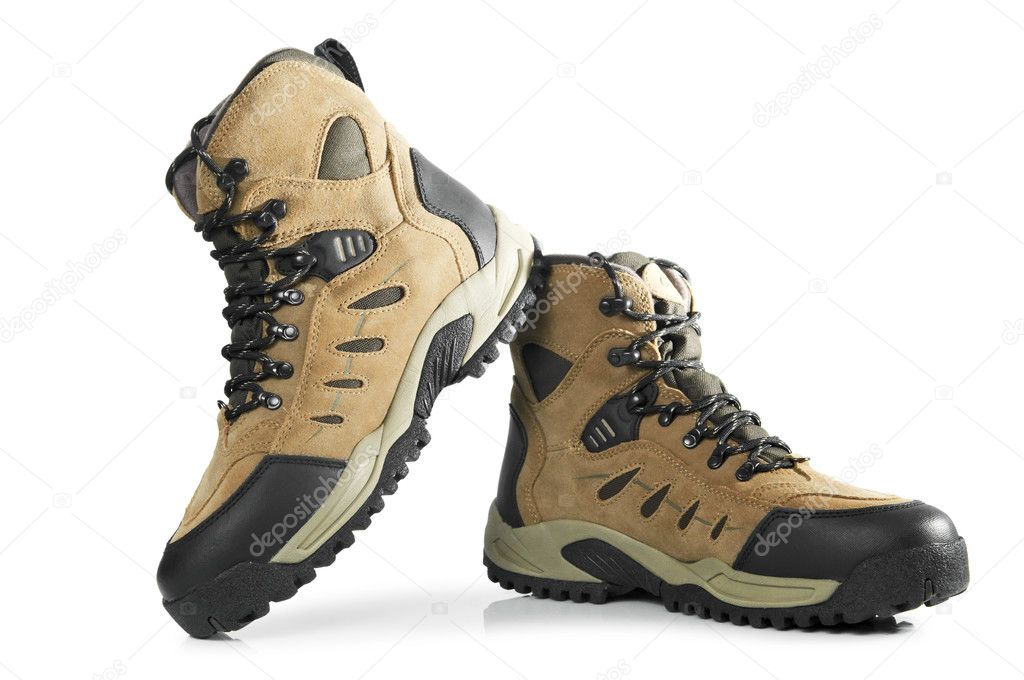 New hiking boots on white background
