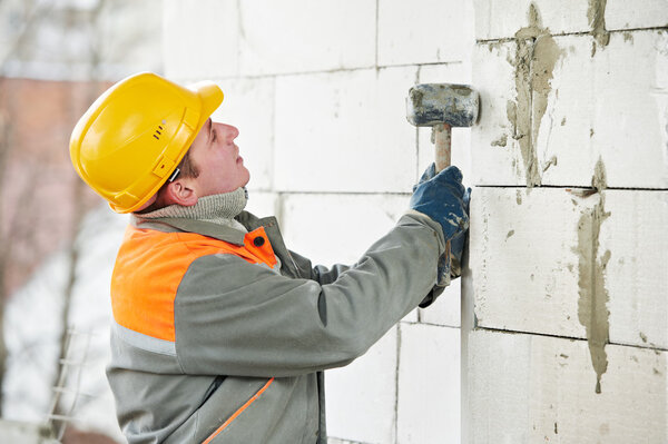 Construction mason worker bricklayer