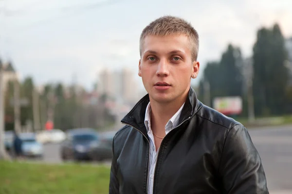 stock image Portrait of a handsome man in a black jacket.
