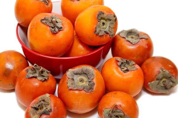 Red juicy persimmons — Stock Photo, Image