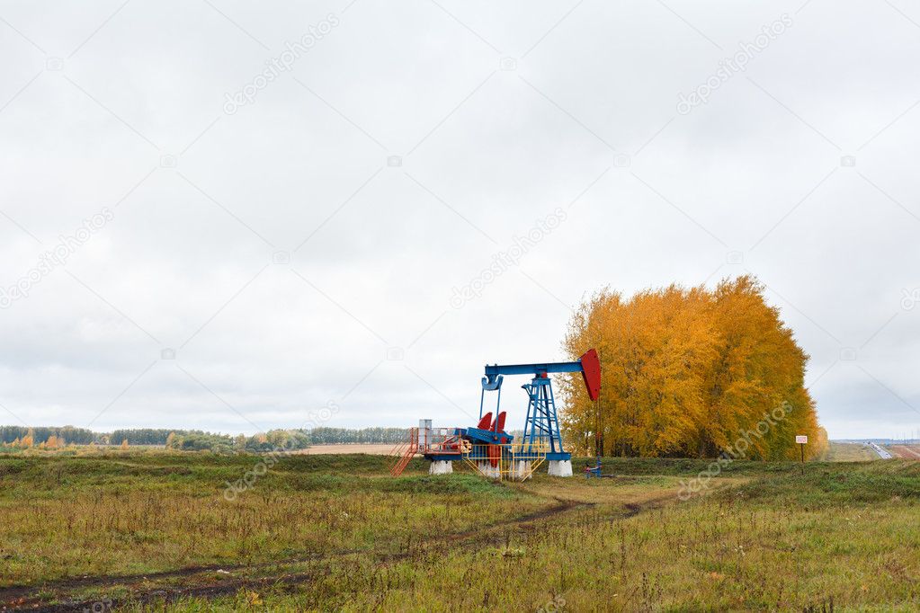 One pump jacks on a oil field.