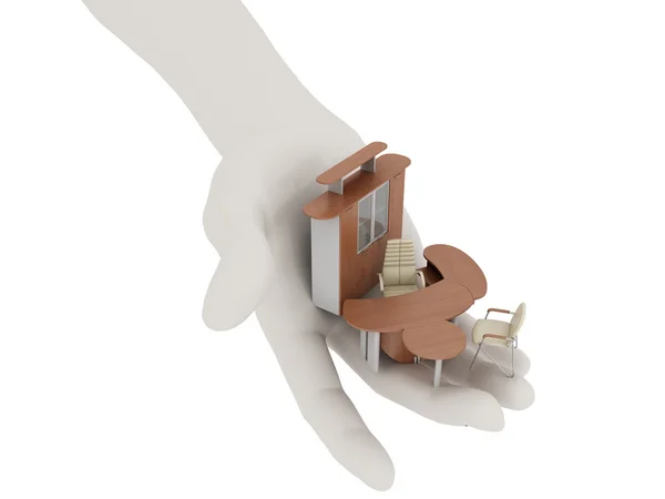 Büromöbel in seiner ausgestreckten Handfläche — Stockfoto
