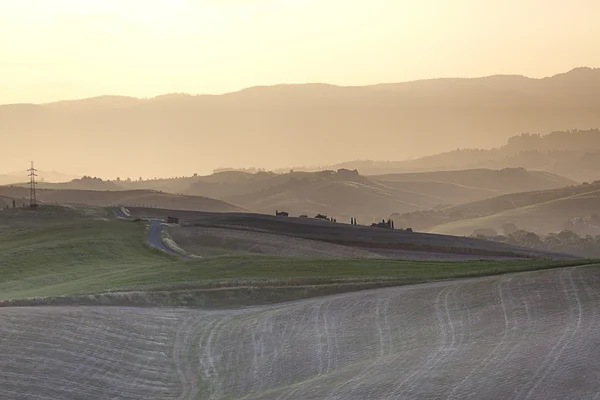 Toscane heuvels bij zonsopgang — Stockfoto