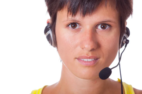 Vrolijke receptioniste met headset — Stockfoto