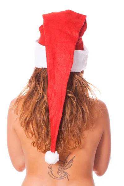 サンタの帽子を持つトップレス女性の背面図 — ストック写真