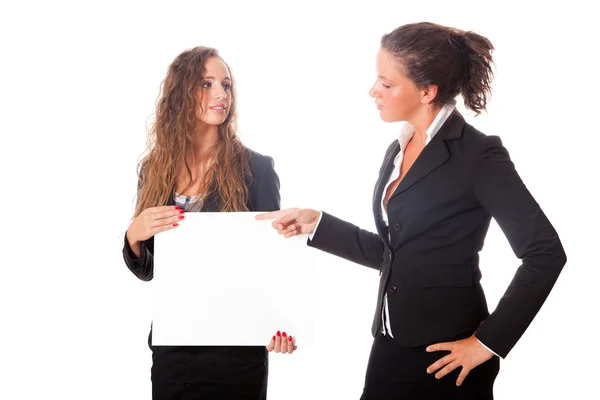 Mulheres de negócios segurando placa em branco — Fotografia de Stock