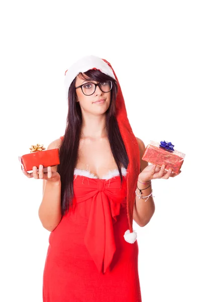 Kadın ile santa şapka ve Noel hediye — Stok fotoğraf