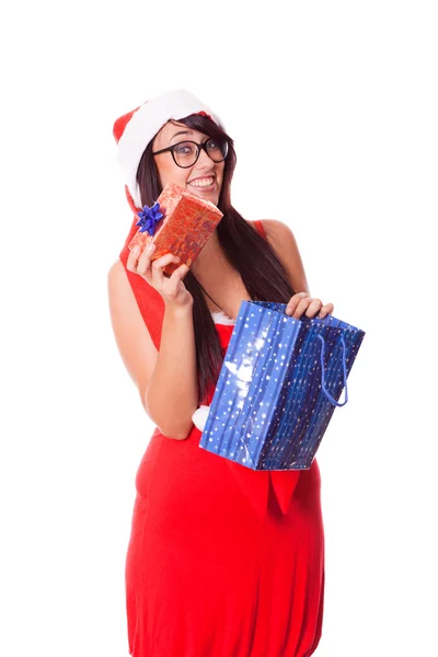 Жінка з капелюхом Санти та різдвяним подарунком — стокове фото