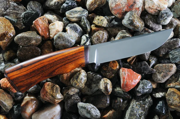 stock image Knife on stones