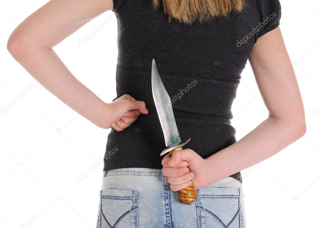 Young woman holding knife