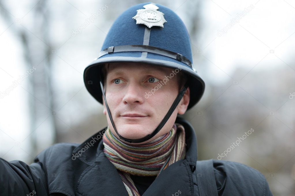 Tomat vare maling Serious man in british police hat Stock Photo by ©AChubykin 7792713