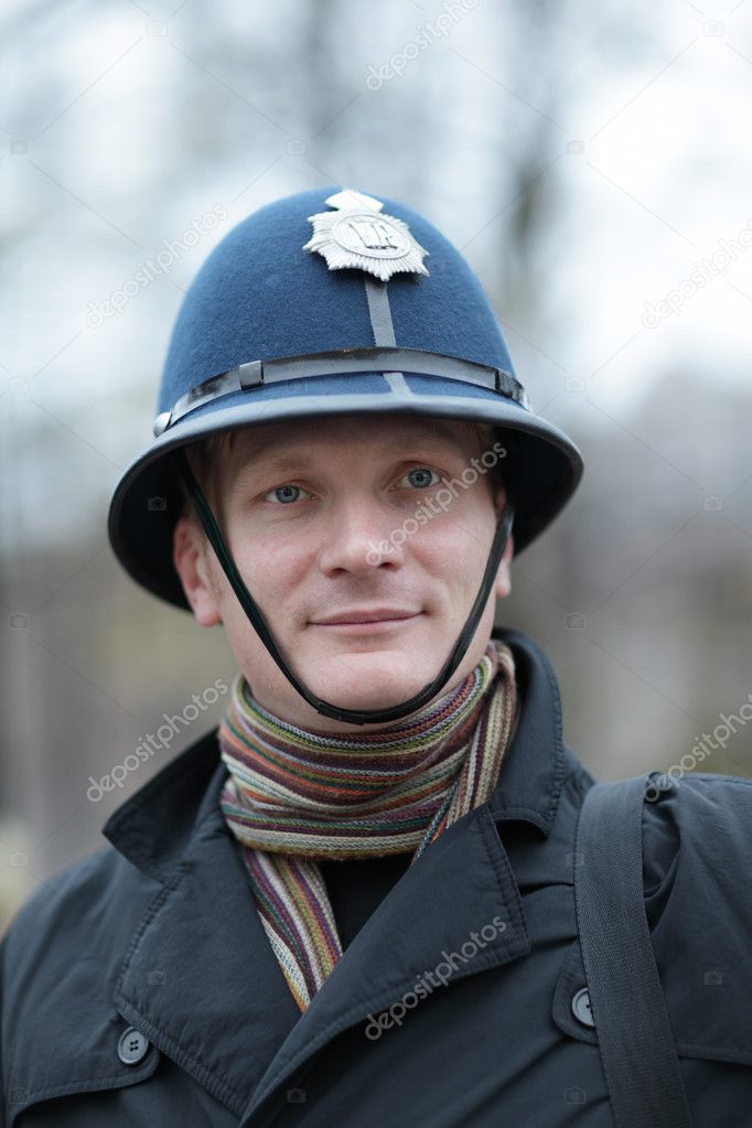 Tourist in british police hat