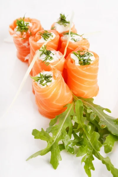 Smoked salmon rolls with cream cheese — Stock Photo, Image
