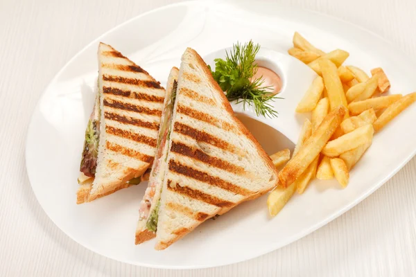 Sandwiches with French fried potatoes — Stock Photo, Image